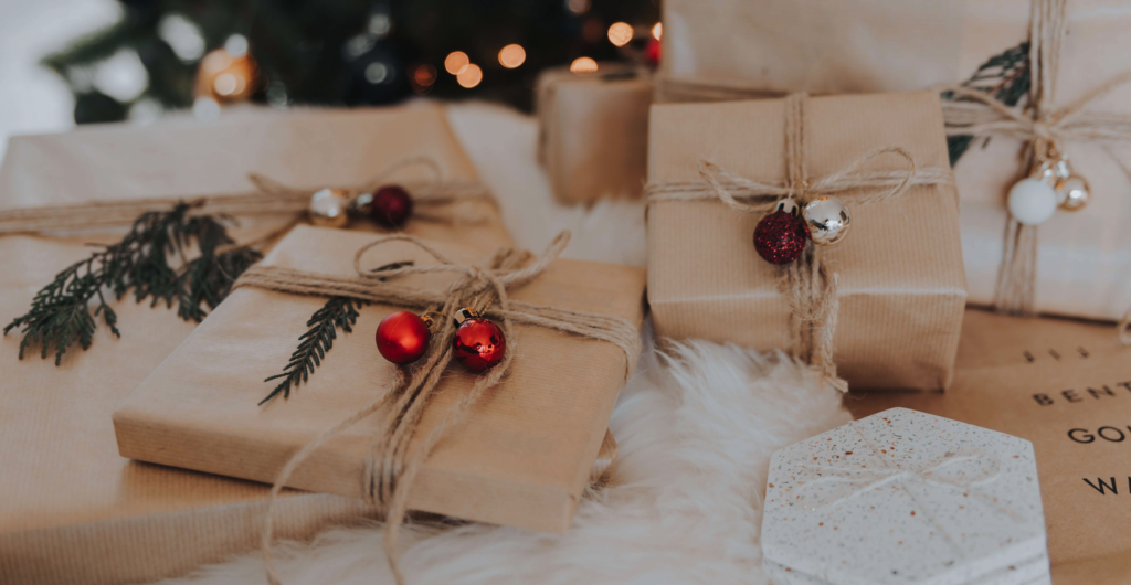 wrapped gifts under a tree