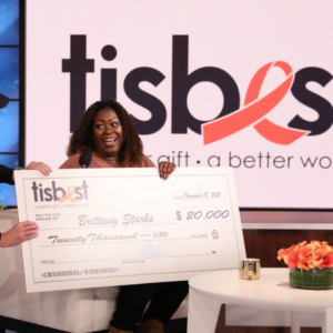 Brittany Starks is presented with a $20,000 TisBest check on The Ellen DeGeneres Show.