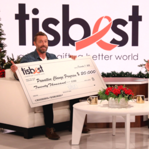 Zach Skow receives a $20,000 TisBest check for Pawsitive Change and a $5,000 TisBest Charity Gift Card on The Ellen DeGeneres Show.
