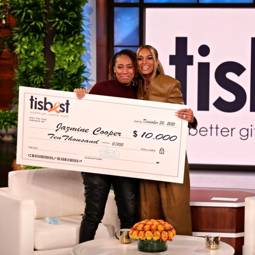 Jazmine Cooper receives a check and TisBest Charity Gift Card on The Ellen DeGeneres Show.