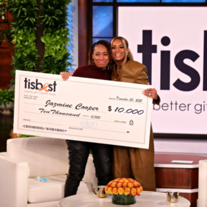 Jazmine Cooper receives a check and TisBest Charity Gift Card on The Ellen DeGeneres Show. 
