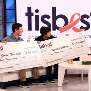 Bobby White and Josh Trujillo both receive checks from TisBest on The Ellen DeGeneres Show.