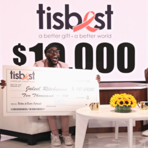 Jaleel Ritchwood-Jordan receives a TisBest check on The Ellen DeGeneres Show.